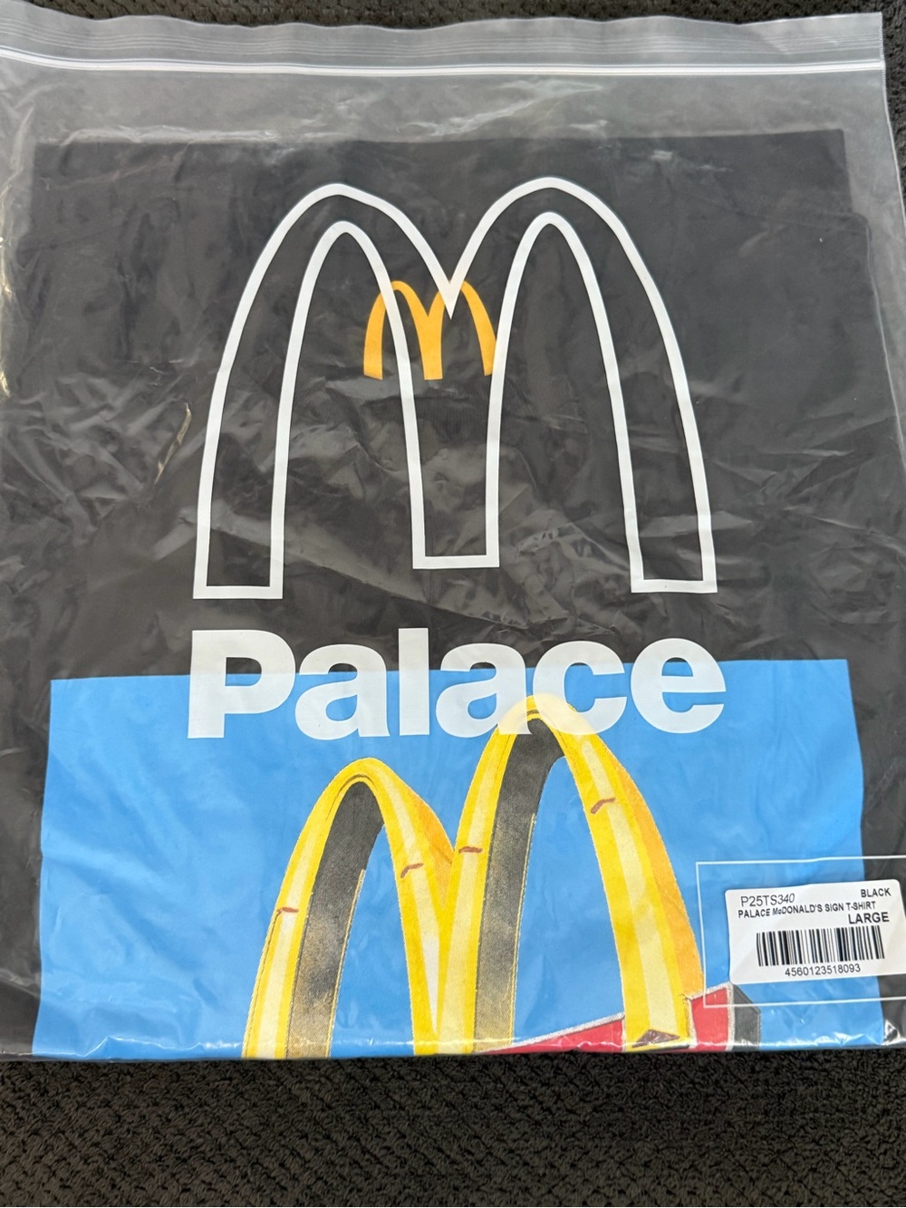 PALACE Black Tee with Blue Block and Yellow Arch Graphic